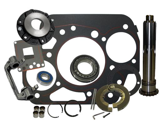 Mechanical parts including a gasket set and various metal components on a white background