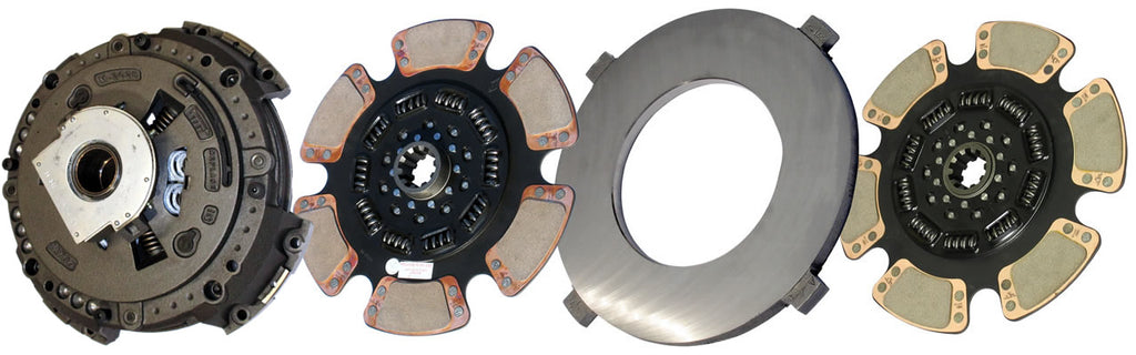 Four clutch plates arranged in a row on a white background