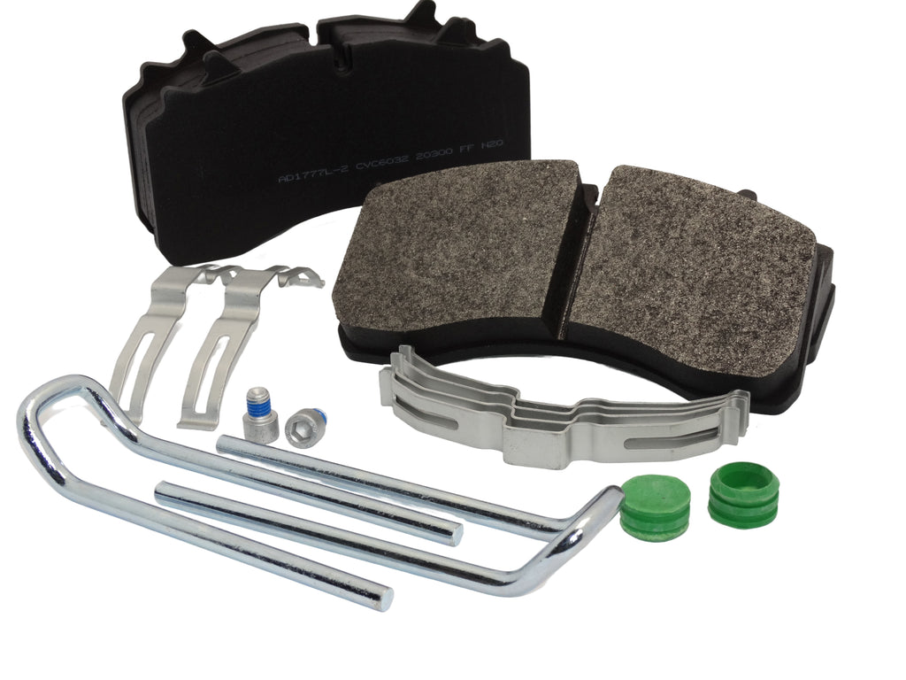 Brake pad set with metal hardware on a white background