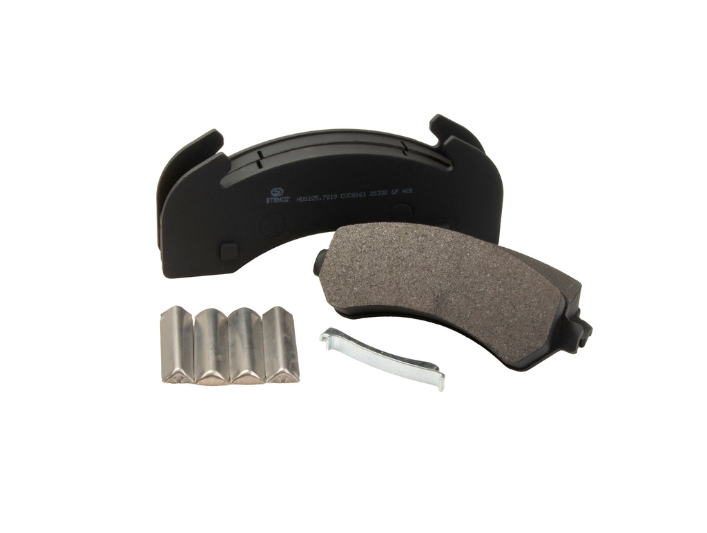 Brake pad set with a black holder on a white background